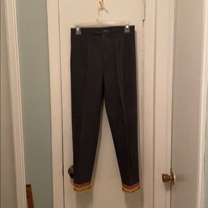 Pants with beaded fringe.